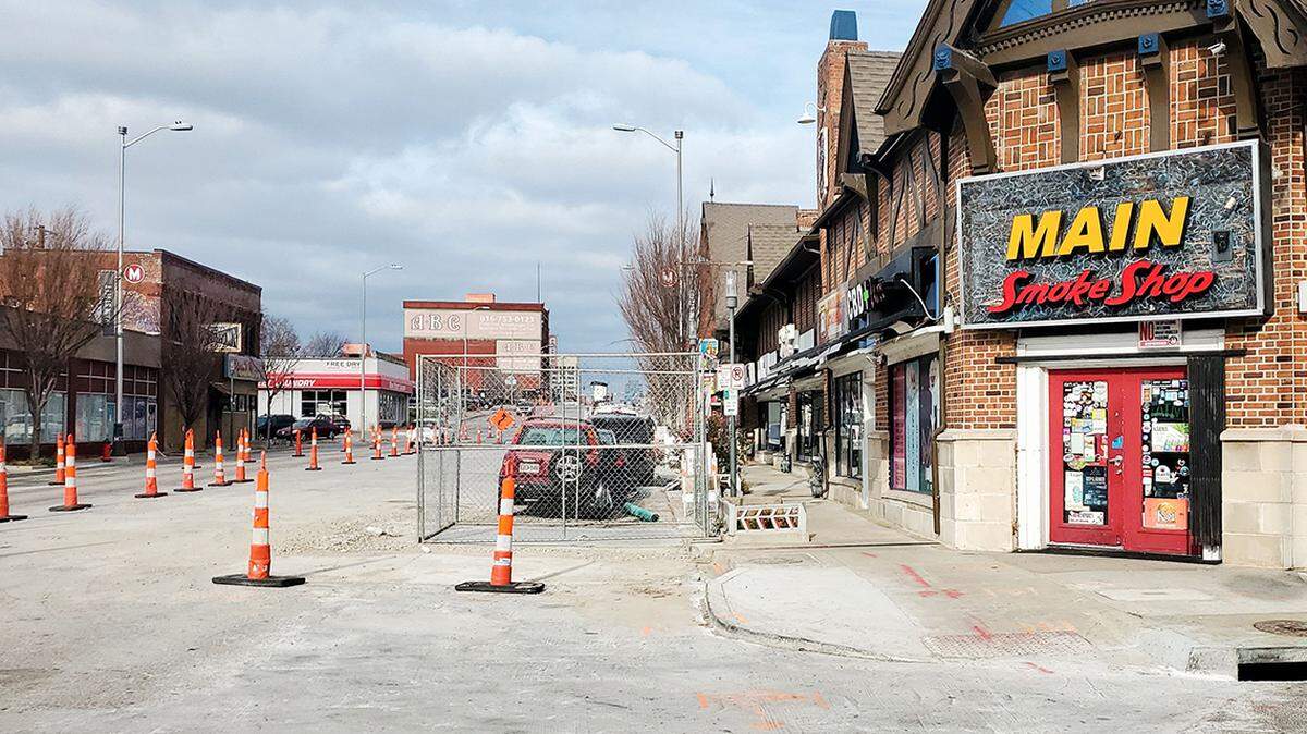 Construction on the streetcar expansion project has Main Street lined with confusing cones and other equipment. Main Smoke Shop at 3429 Main has survived thanks to a loyal customer base.