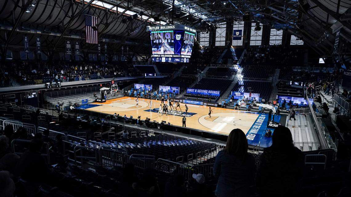 Colorado tips off with Georgetown to start the first half of a first-round game in the NCAA men’s college basketball tournament at Hinkle Fieldhouse in Indianapolis, Saturday, March 20, 2021. Restrictions due to the COVID-19 pandemic have limited crowds, reduced interactions and created an abnormal NCAA experience for those involved. (AP Photo/Michael Conroy)
