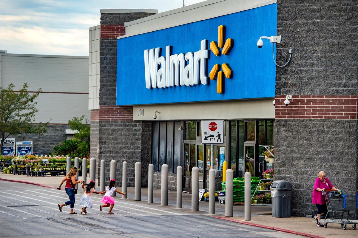 Customers flow in and out of Walmart, 7701 E. Frontage Road in Overland Park.