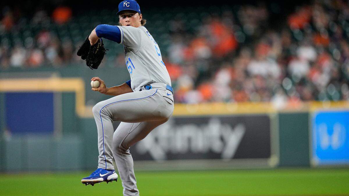 Kansas City Royals starting pitcher Brady Singer throws against the Astros during the first inning Tuesday in Houston.