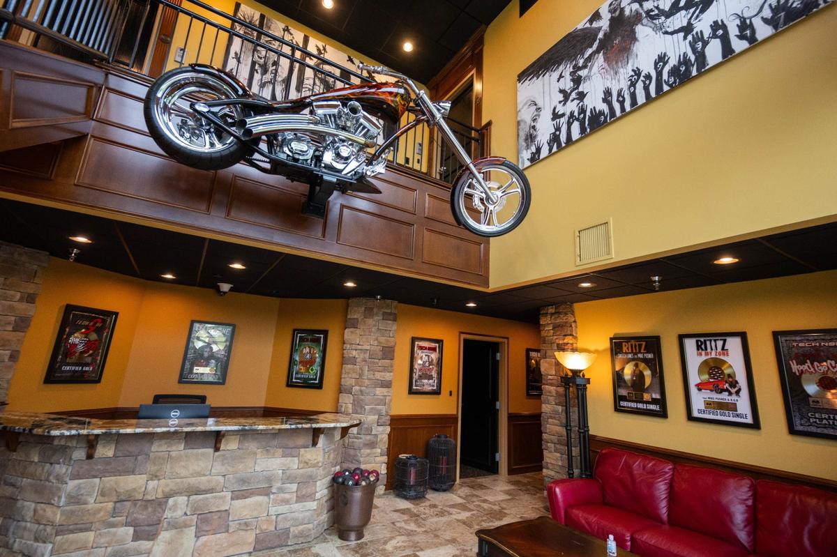 The building that houses the recording studios at Strange Music greets visitors with a chopper style motorcycle hanging from the wall, a tribute to the chopper style rapping that label head and recording artist Tech N9ne is known for.