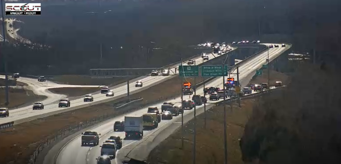 U.S. 71 southbound lanes were closed in Kansas City on Wednesday, Jan. 7, due to a homicide probe by KCPD near Blue River Road; KC Scout cameras show police activity and a diversion at East 75th Street.