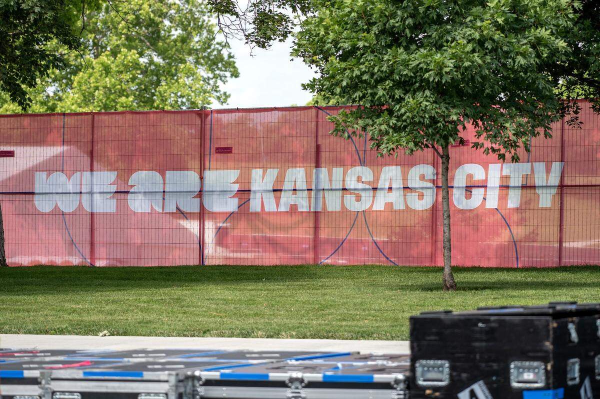 A banner is displayed on fencing surrounding the FIFA Fan Festival site at the National WWI Museum and Memorial on Wednesday, May 27, 2026, in Kansas City.