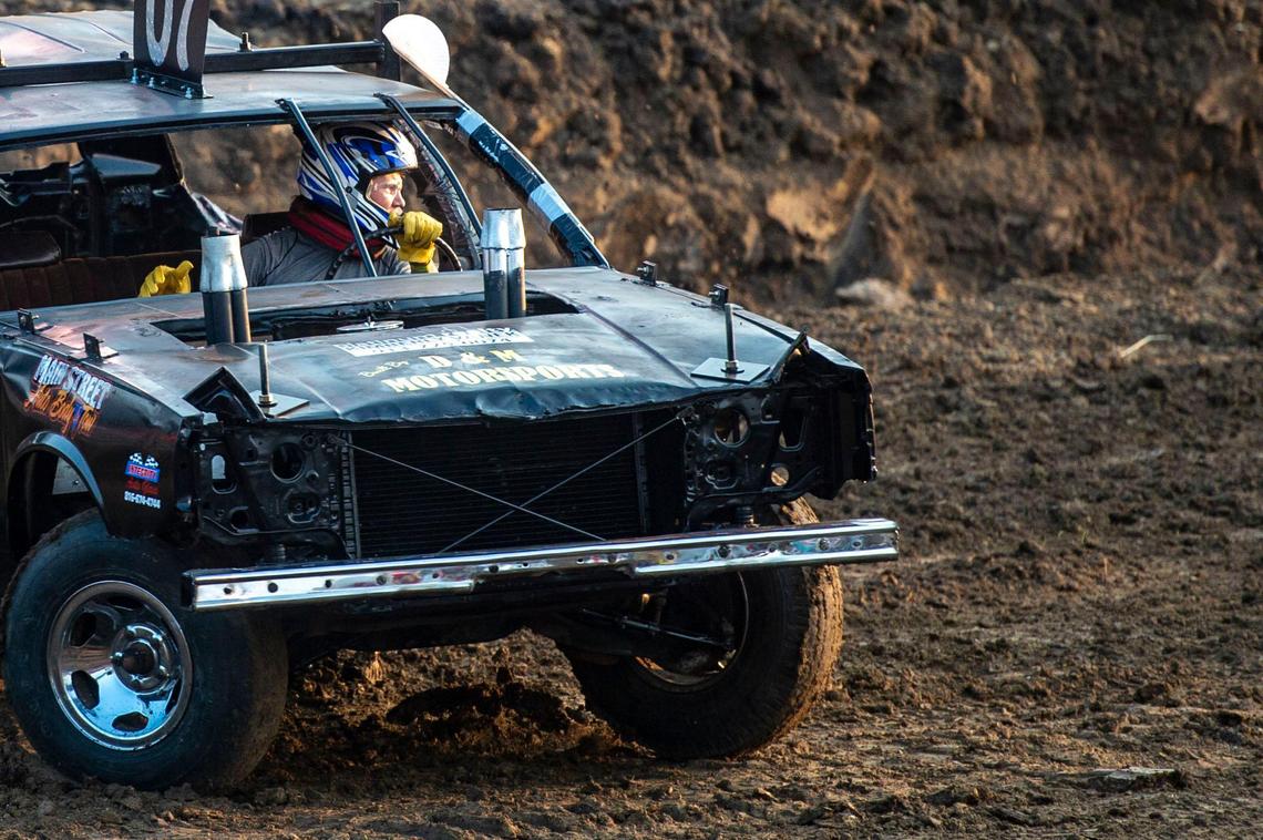 Jaden Vaner looks for other cars during the demolition derby at the Platte County Fair, Thursday, July 22, 2021, in Tracy, Missouri.