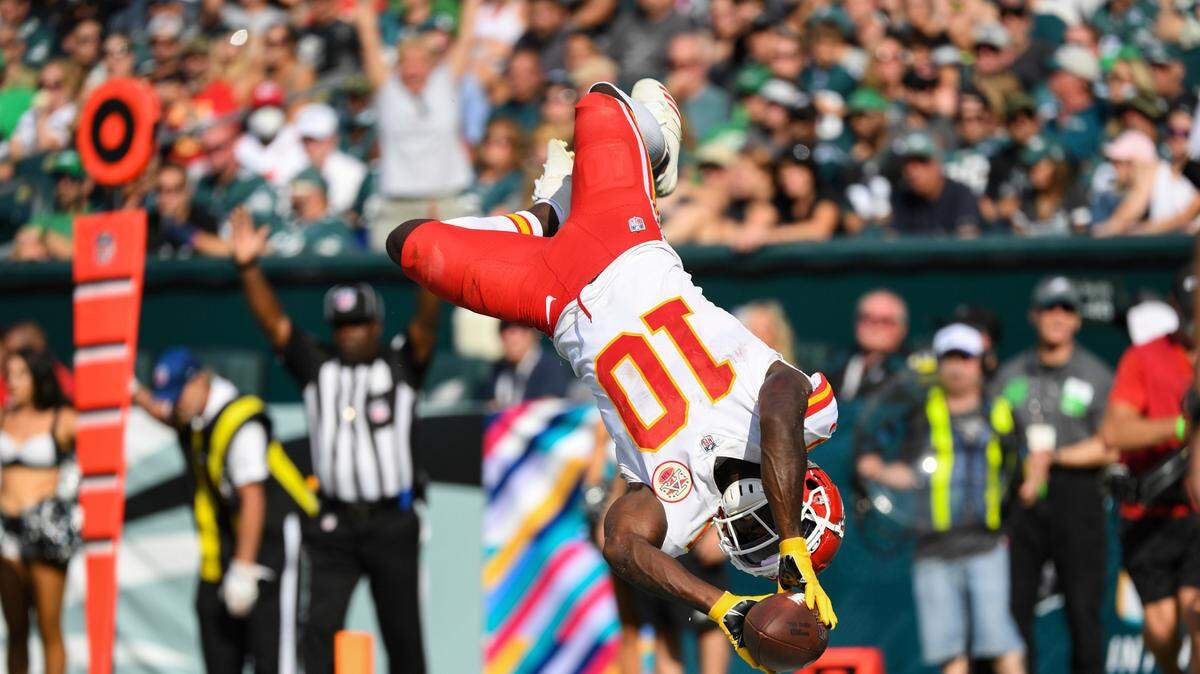 Kansas City Chiefs wide receiver Tyreek Hill (10) does a back flip after scoring a fourth quarter touchdown during an NFL football game against the Philadelphia Eagles, Sunday, Oct. 3, 2021, in Philadelphia. (AP Photo/Terrance Williams)