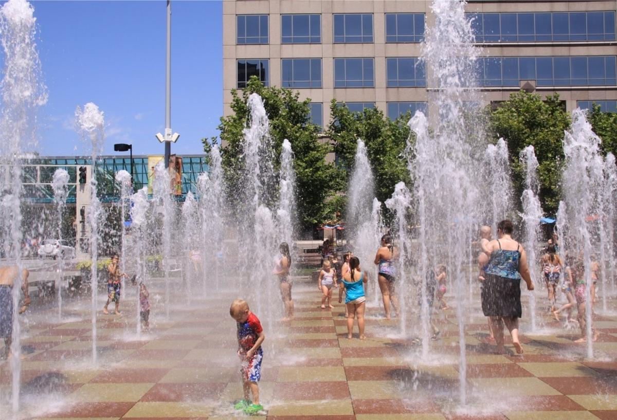 Children keep cool in the fountains at Crown Center in August 2010.
