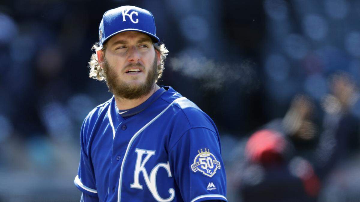 Royals reliever Brandon Maurer walked off the field after giving up a two-run homer to the Indians' Yan Gomes in the ninth inning of a 3-1 loss Sunday in Cleveland.