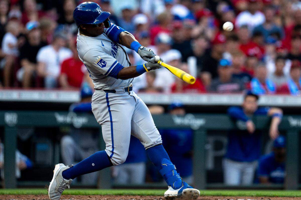 Kansas City Royals left fielder Dairon Blanco (44) hits a grand slam in the third inning of the MLB game between the Cincinnati Reds and Kansas City Royals at Great American Ball Park in Cincinnati on Saturday, Aug. 17, 2024.