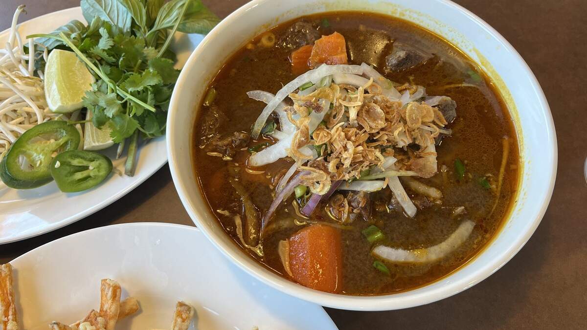 Vietnam Cafe’s Phở Bò Kho (beef stew with noodles; $14.75) which is served with fresh bean sprouts, basil, cilantro, jalapeno peppers and lime.