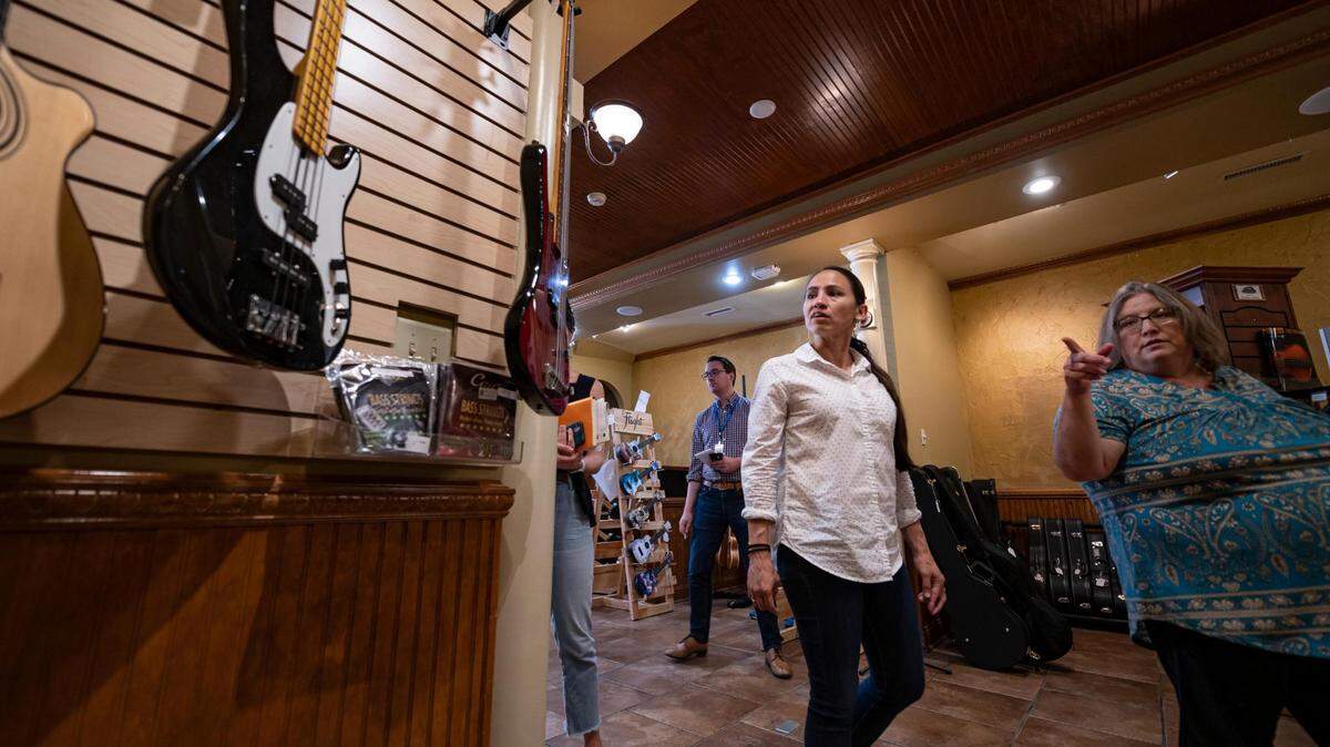 Democratic Rep. Sharice Davids toured Grandpa Barry’s Guitars with owner Eileen Spickler in July in Ottawa, Kansas.