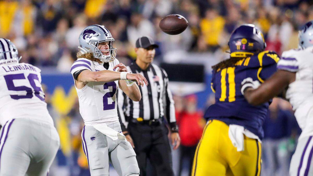 Kansas State Wildcats quarterback Avery Johnson (2) throws a pass during the first quarter against the West Virginia Mountaineers at Mountaineer Field at Milan Puskar Stadium on Oct. 19, 2024.