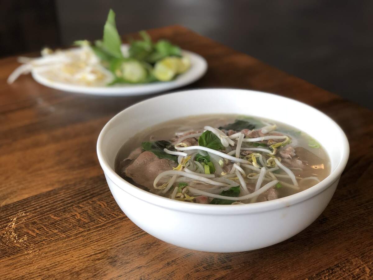 The beef pho at Pho Tuoi in Gladstone’s Little Saigon Plaza costs $8.49 for a regular bowl and comes with the customer’s choice of beef. Options include sliced ribeye, brisket, flank, tendon and tripe.