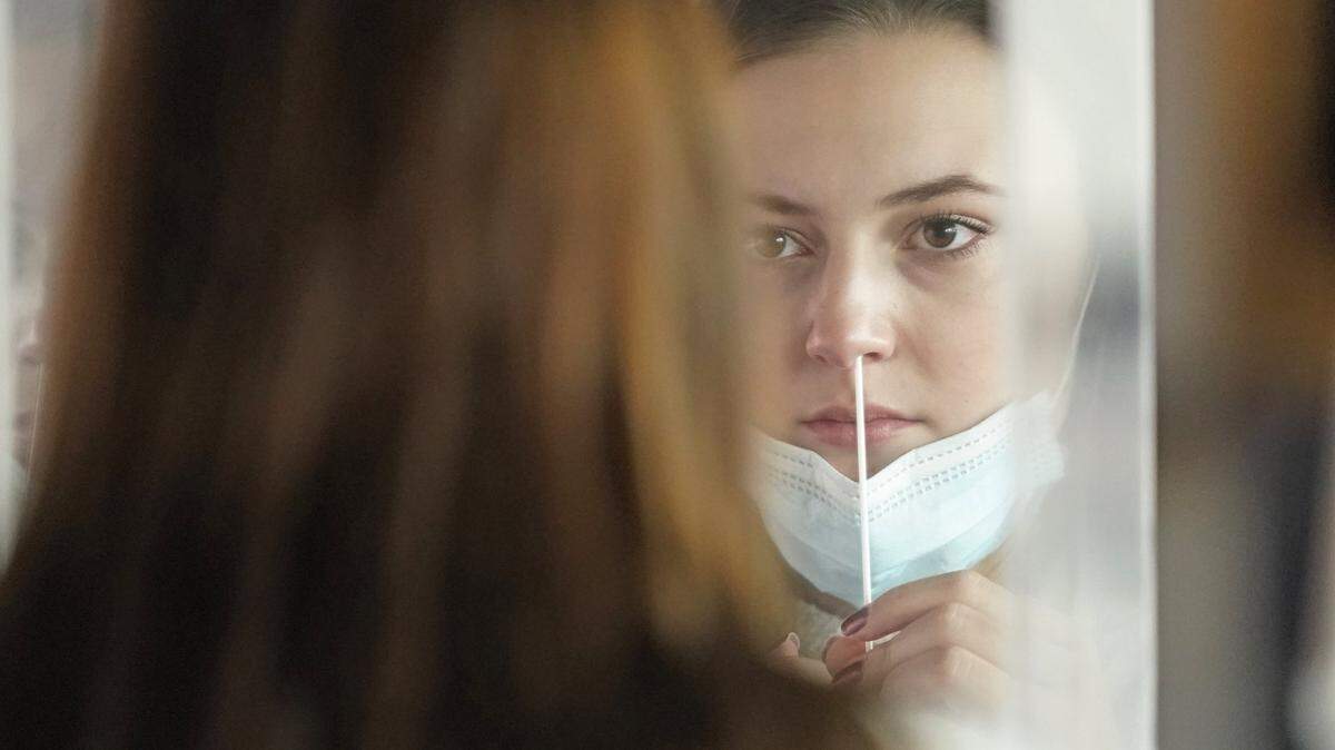 At-home coronavirus testing kits such as the one pictured are sold out across Kansas City, and rapid testing sites report heavy traffic as demand grows, but the state can ship a test to you for free.