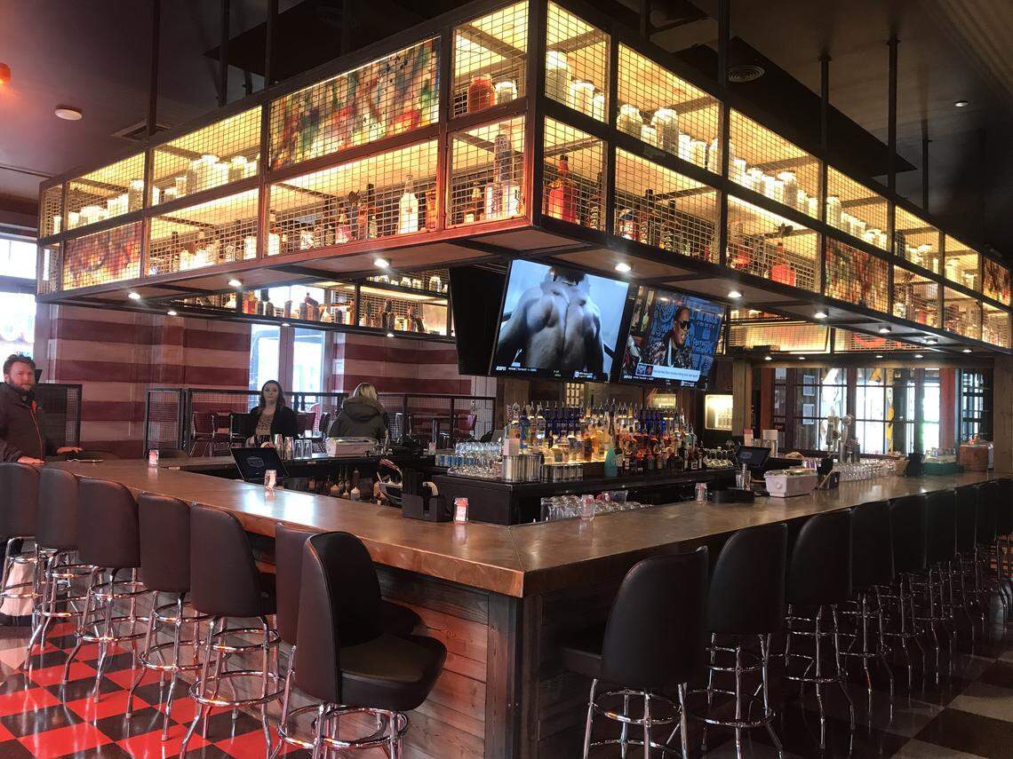 Guy Fieri’s Dive & Taco Joint has two bar areas, including a “statement” bar in the heart of the room.