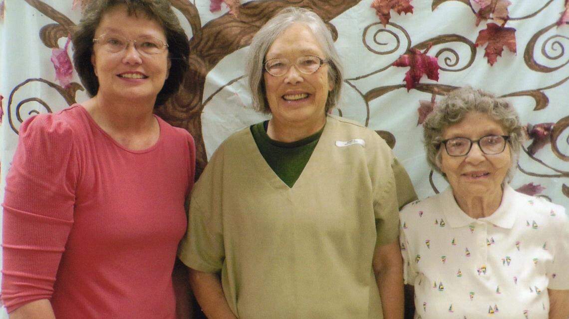 Sandra Hemme, center, is seen during a family visit in prison in 2022.
