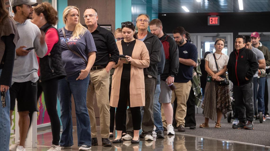 Voters line up to cast their ballots during advanced voting Monday, Nov. 4, at the Johnson County Arts and Heritage Center in Overland Park.