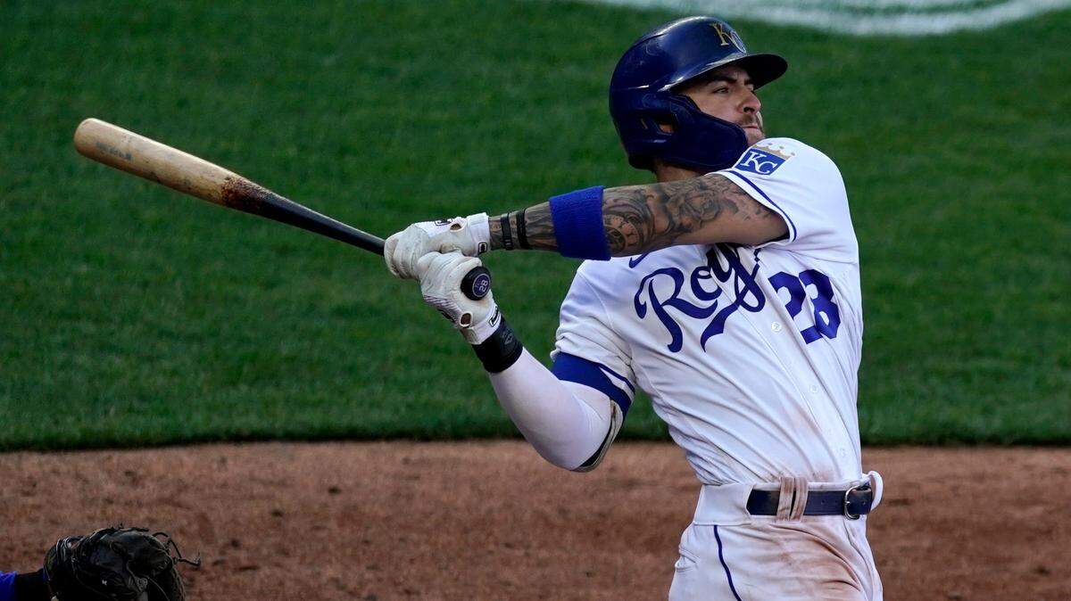 Kansas City Royals’ Kyle Isbel bats during the sixth inning of a baseball game against the Texas Rangers Thursday, April 1, 2021, in Kansas City, Mo. (AP Photo/Charlie Riedel)