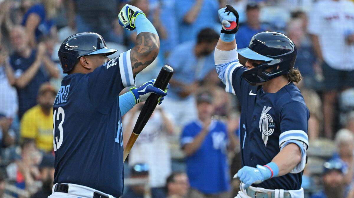 Kansas City Royals shortstop Bobby Witt Jr. (7) celebrates with Salvador Perez (13) after hitting a solo home run in the first inning against the Boston Red Sox at Kauffman Stadium on Sept. 1, 2023.