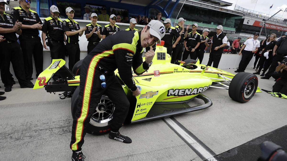 Simon Pagenaud, of France, celebrates after winning the pole for the Indianapolis 500 on Sunday.