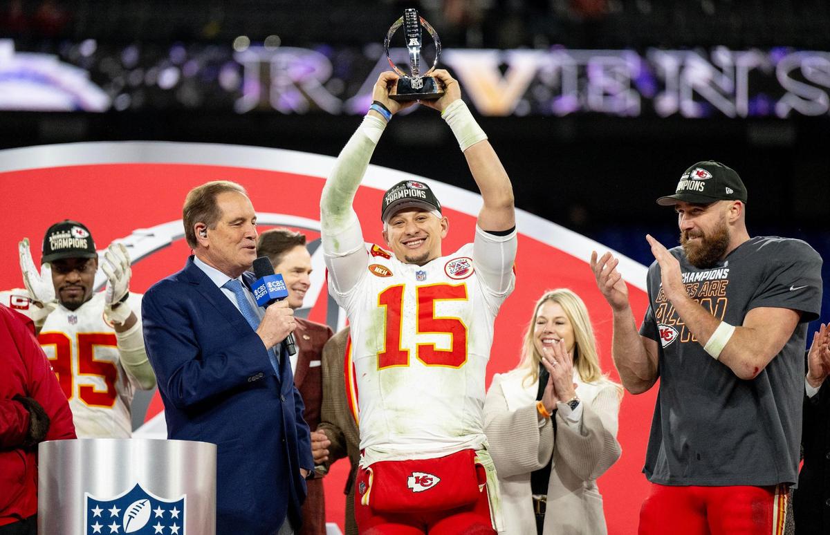 Kansas City Chiefs quarterback Patrick Mahomes (15) hoists the Lamar Hunt Trophy after the Chiefs defeated the Baltimore Ravens 17-10 in the AFC Championship Game on Sunday, Jan. 28, 2024, in Baltimore.