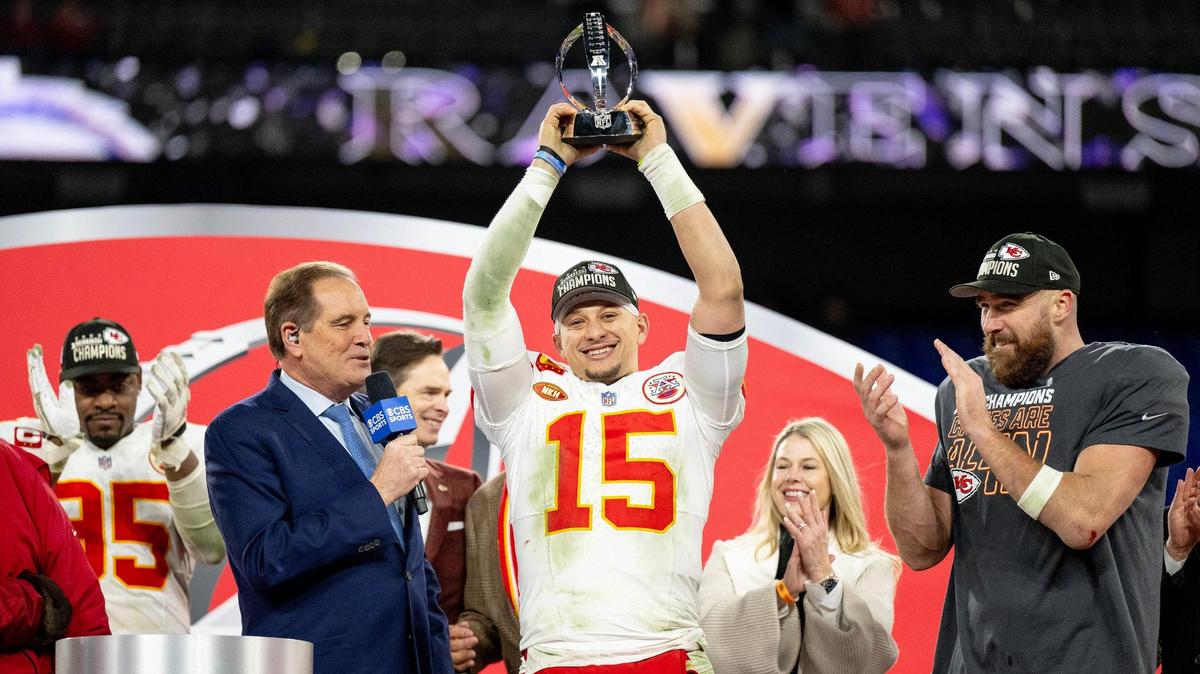 Kansas City Chiefs quarterback Patrick Mahomes (15) hoists the Lamar Hunt Trophy after the Chiefs defeated the Baltimore Ravens 17-10 in the AFC Championship Game on Sunday, Jan. 28, 2024, in Baltimore.