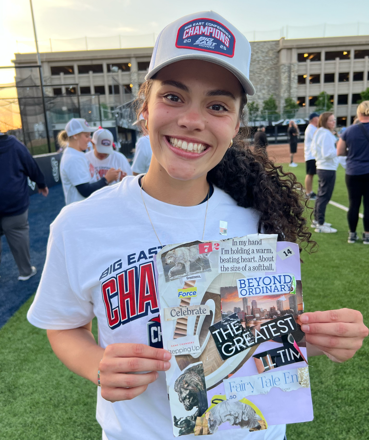 Lexi Hastings holds her vision board after winning the Big East Conference softball championship with the UConn Huskies on May 10, 2025.