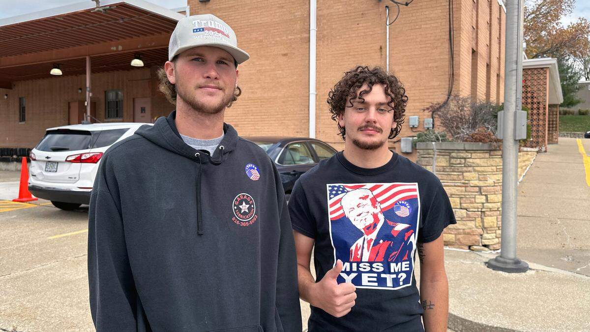 Construction workers Cooper Solminski, left, and Colin Phipps cast their ballots Tuesday at the Clay County Election Board, 100 W. Mississippi St. in Liberty.