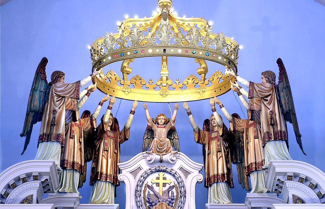 Angels support a crown above the altar of Our Lady of Sorrows. The Catholic church which would be located southeast of the home plate of a new Royals ballpark, according to April 22 renderings.