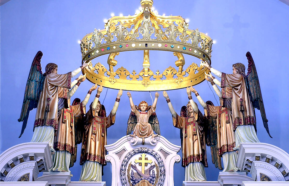 Angels support a crown above the altar of Our Lady of Sorrows. The Catholic church which would be located southeast of the home plate of a new Royals ballpark, according to April 22 renderings.