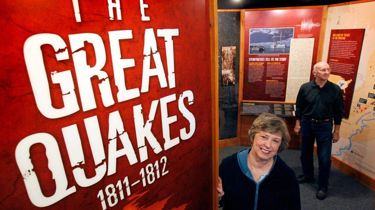 Visitors in a New Madrid exhibit examining the earthquakes that happened in the town over 200 years ago.
