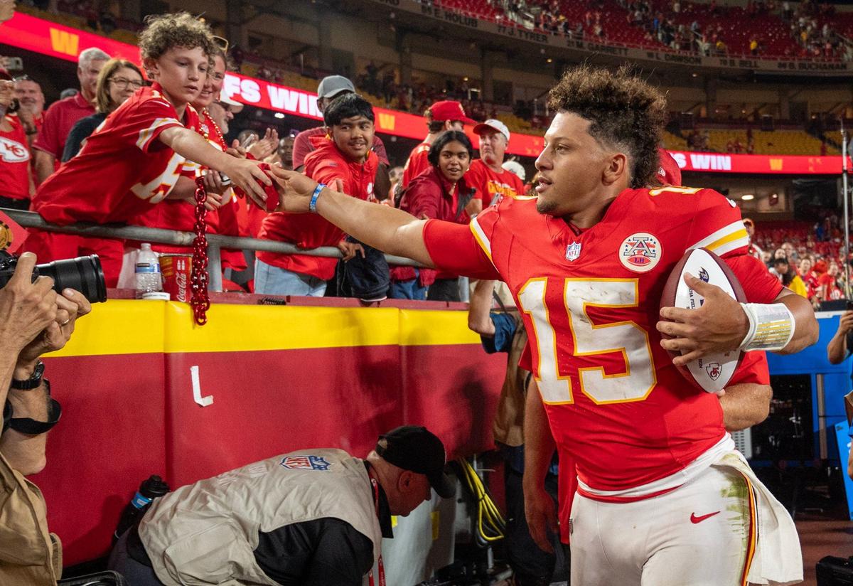 Kansas City Chiefs quarterback Patrick Mahomes (15) greeted fans after the team defeated the Baltimore Ravens, 27-20 on Thursday, Sept. 5, 2024, at GEHA Field at Arrowhead Stadium.