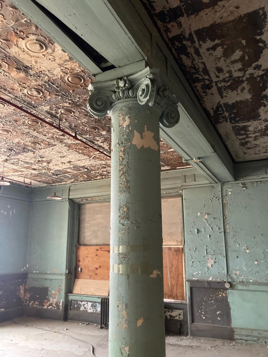 The seven-story Moline Plow Company building, 1015 Mulberry St., is to be turned into a 121-unit apartment building with some units featuring tin ceilings and columns with ornate cornices.