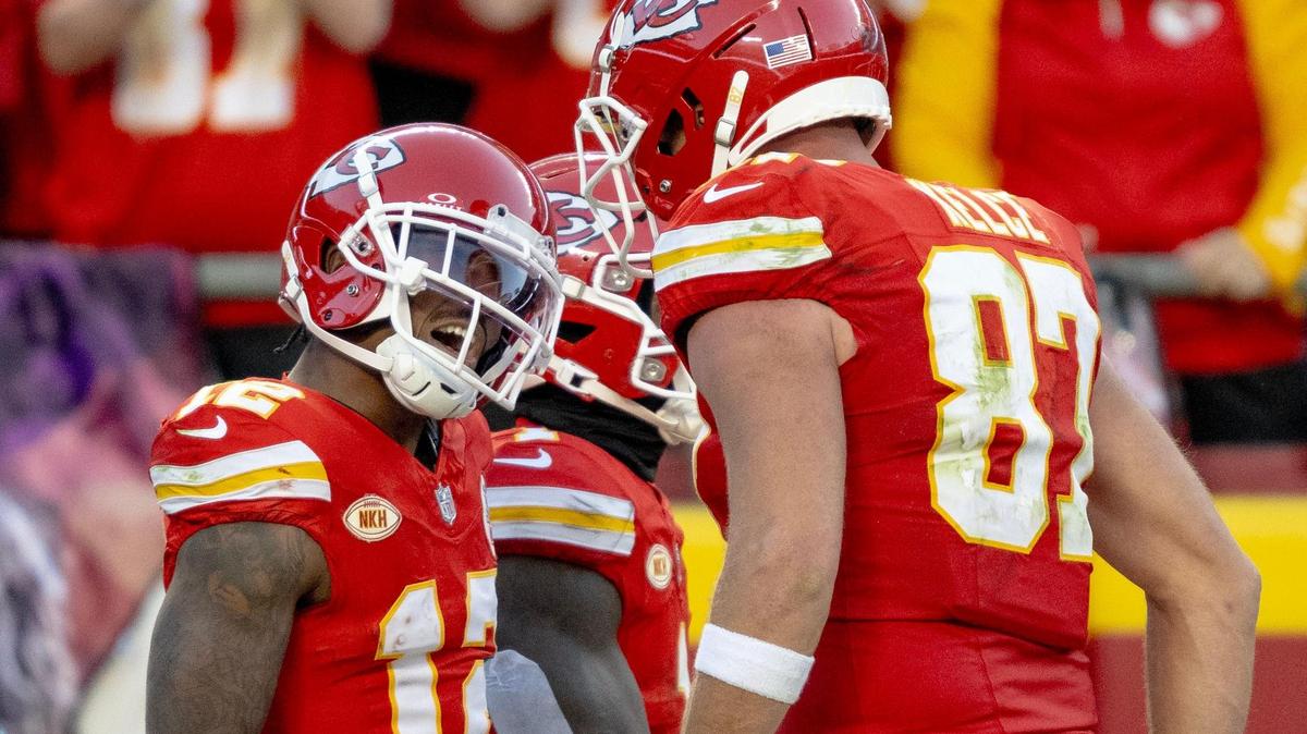 Kansas City Chiefs wide receiver Mecole Hardman Jr. (12) celebrates a punt return with tight end Travis Kelce (87) during an NFL football game against the Los Angeles Chargers at GEHA Field at Arrowhead Stadium on Sunday, Oct. 22, 2023, in Kansas City.