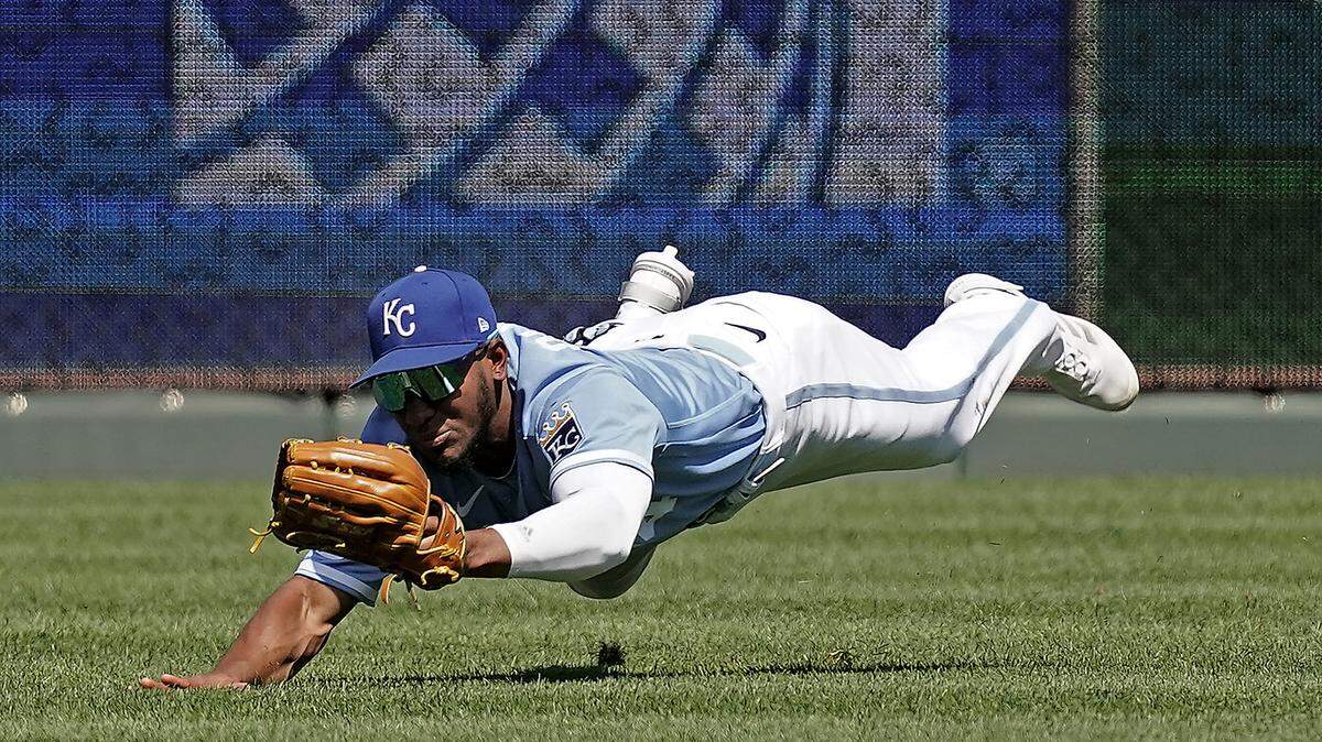 Kansas City Royals right fielder Edward Olivares catches a line drive for the out on Cleveland Guardians’ Nolan Jones during the first inning of a baseball game Saturday, July 9, 2022, in Kansas City, Mo. (AP Photo/Charlie Riedel)