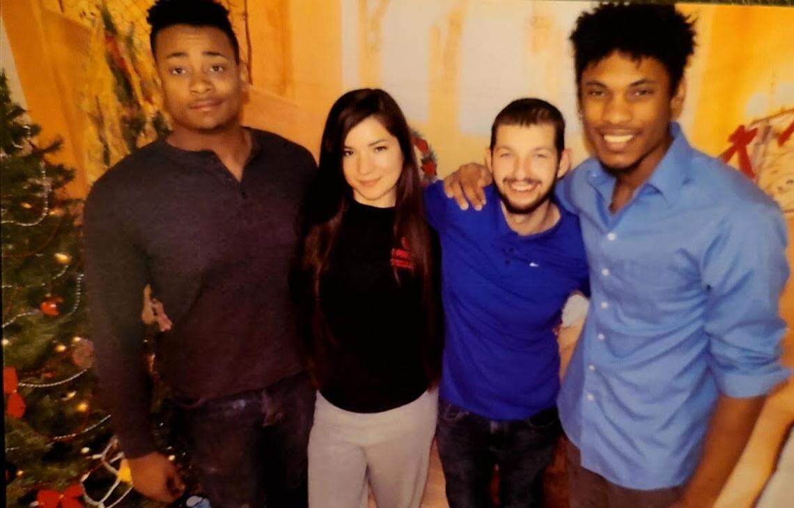 Sarah Gonzales-McLinn with her three brothers.