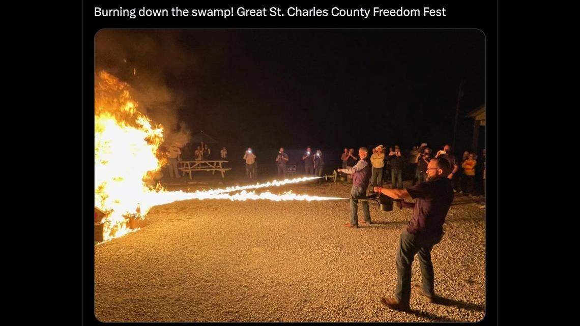 A screenshot of a social media post from Missouri Republican state Sen. Nick Schroer showing Schroer and state Sen. Bill Eigel using flamethrowers on a stack of cardboard boxes in Defiance.