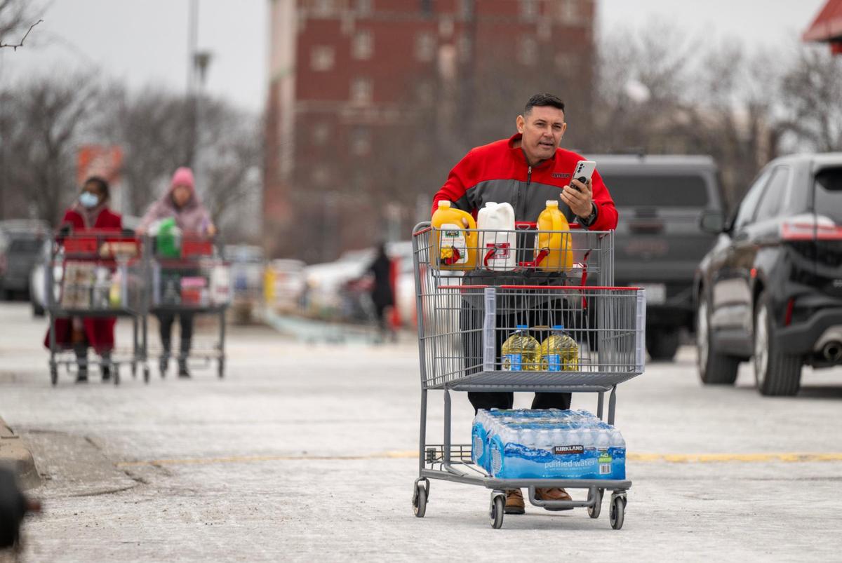 Ahead of the incoming storm, shoppers loaded up on essentials at Costco on Saturday, Jan. 4, 2025, in midtown Kansas City. The storm is expected to bring heavy snow, rain, ice and wind to the to the area.