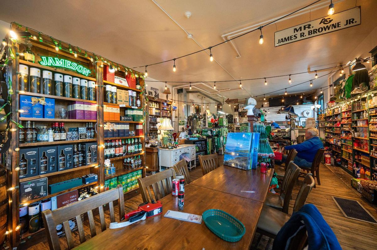 Walls and shelves are filled with whiskey, food, and other Irish merchandise at Browne’s Irish Marketplace.
