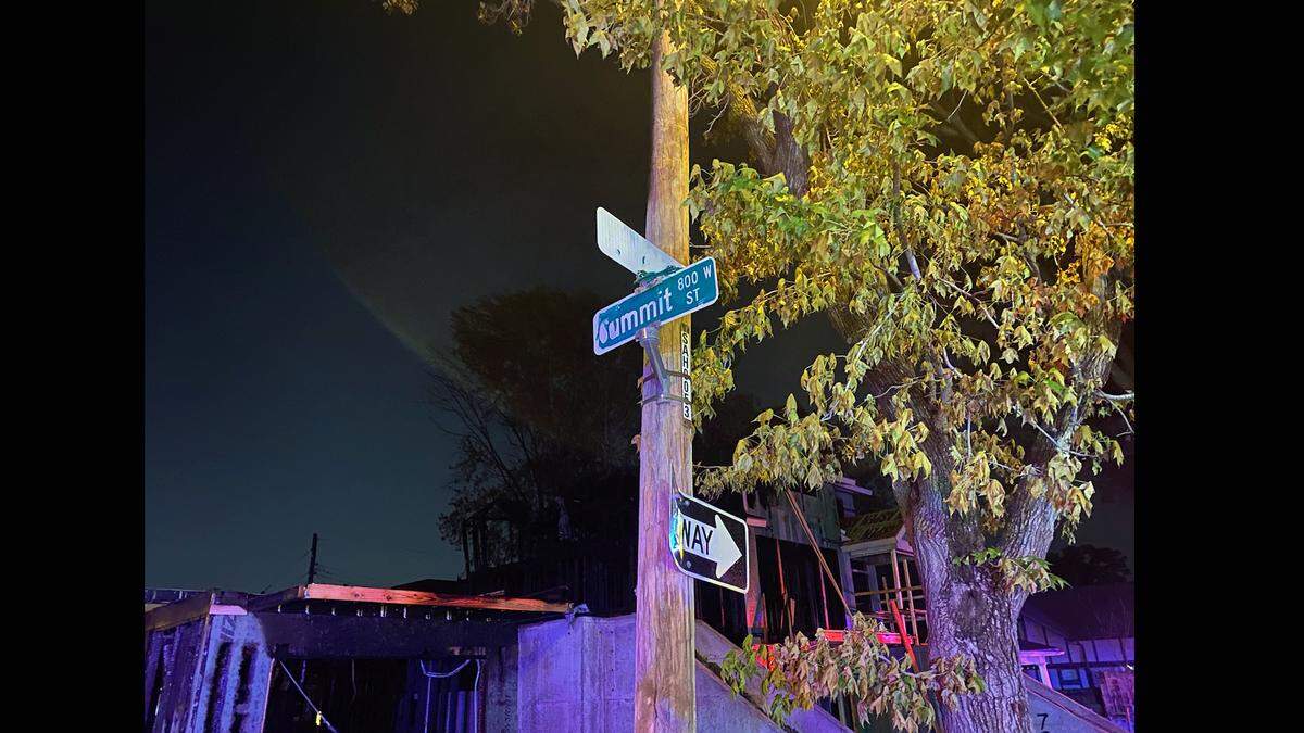 A suspicious two-alarm fire that destroyed two houses under construction Sunday evening was so intense it melted street signs and the bumpers off cars in Kansas City.