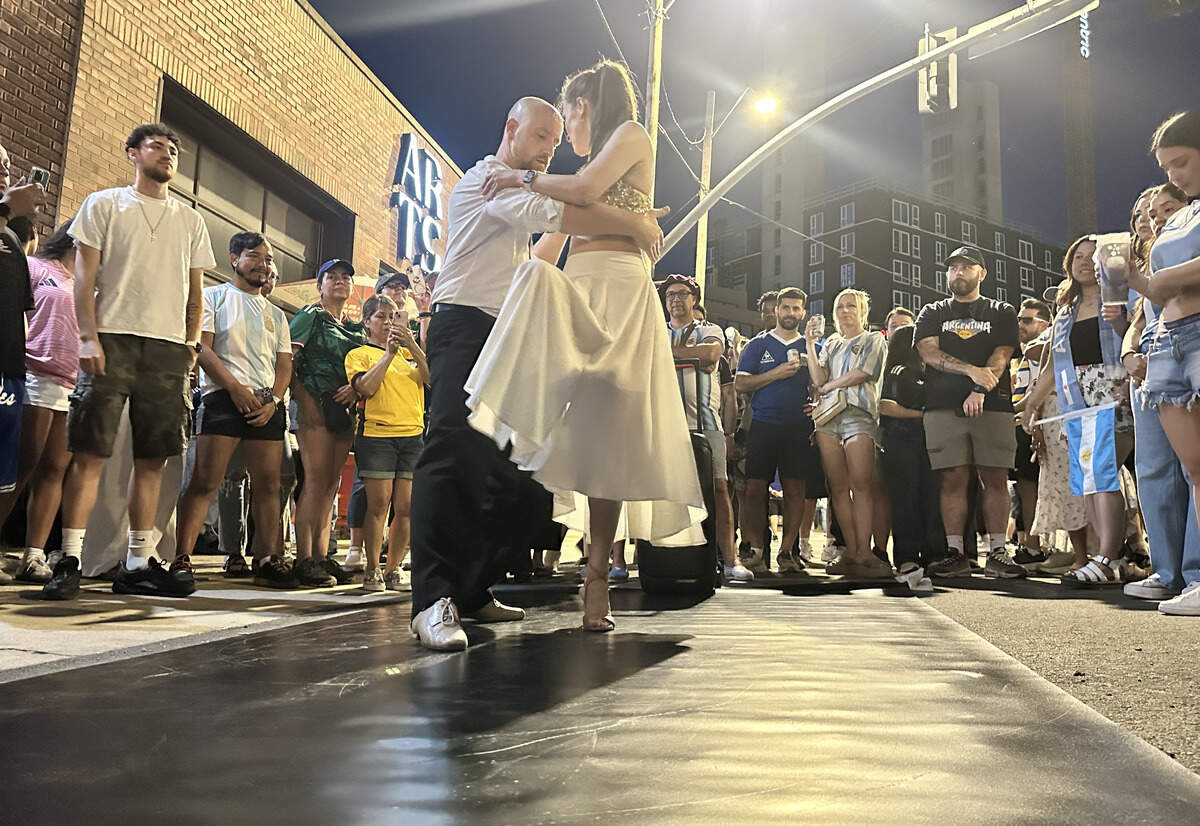 Kansas City locals Kirill Miniaev and Sophia Miniaeva, also known as Tango Matiz, dance the Tango while fans watched. They performed several dances throughout the night.