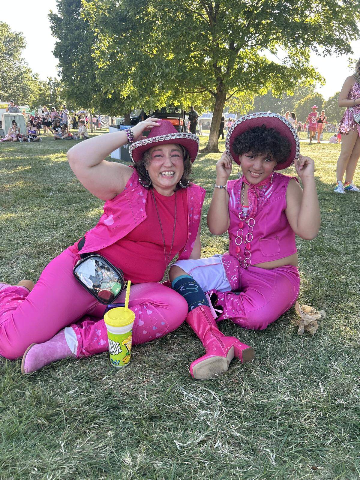 Tiffany McLemore and her 10-year-old daughter, Kristen, in matching “Pink Pony Club”-themed outfits at the Chappell Roan concert in Kansas City on Saturday, Oct. 4.