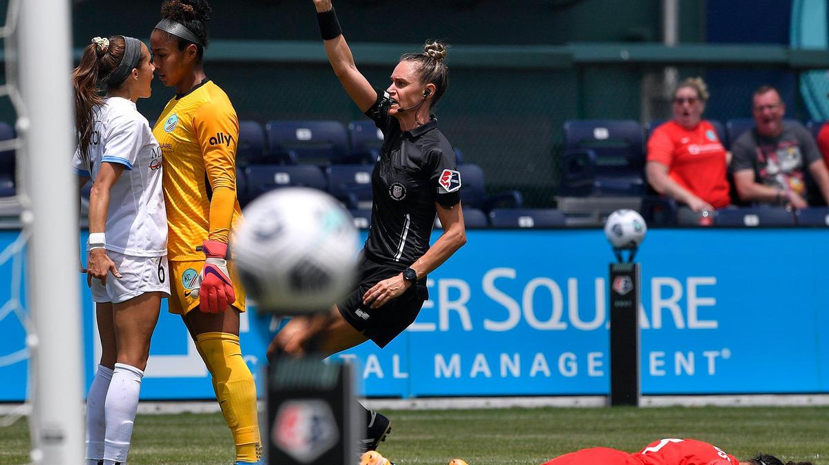 KC NWSL goalie Abby Smith goes toe to toe with Houston’s Shea Groom after Groom took out KC NWSL’s Kristen Edmonds during the first period of Sunday’s match at Legends Field in Kansas City. Groom was issued a yellow card on the play.