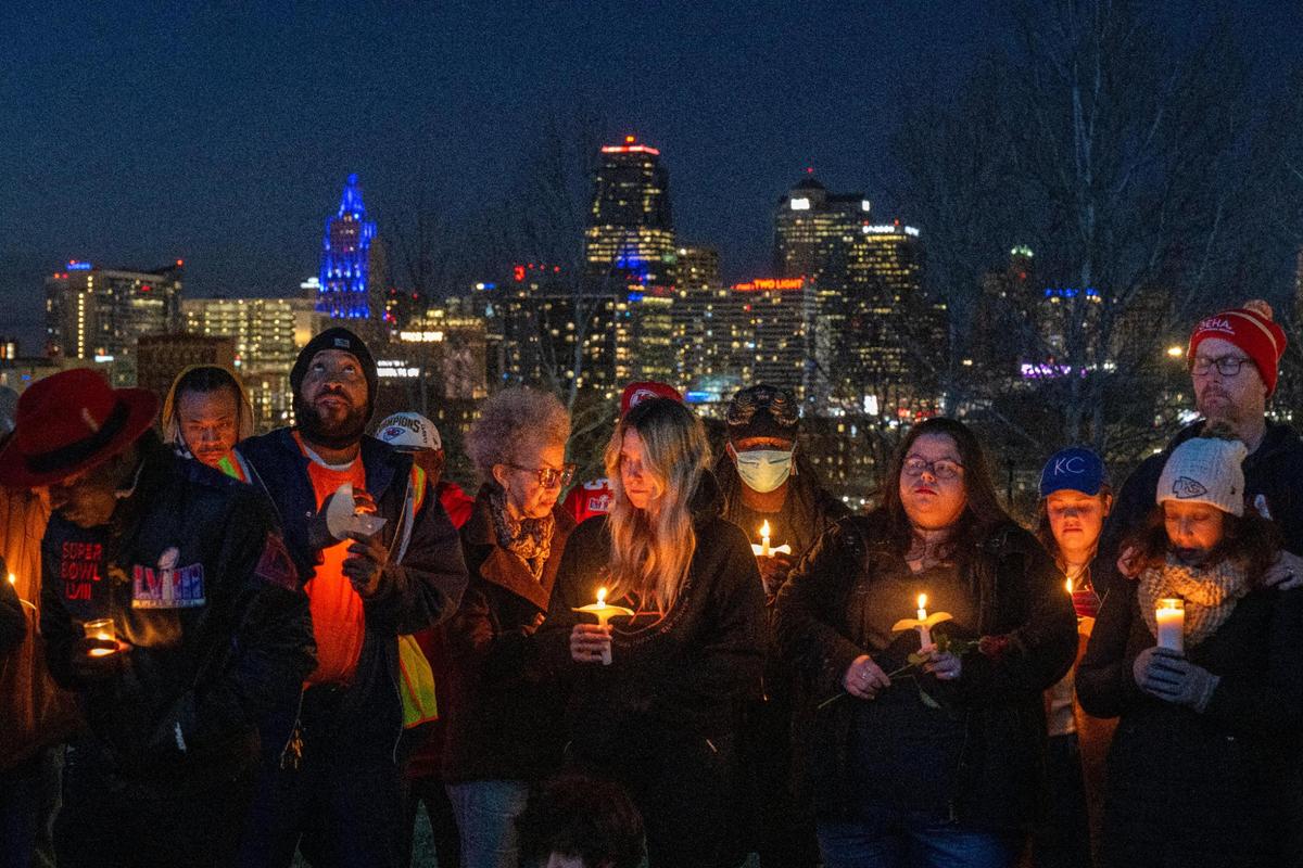 Members of the community gathered at Skywalk Memorial Park in Kansas City for a candlelight vigil Thursday, Feb. 15, 2024, to show support for the victims of the mass shooting, including Lisa Lopez-Galvan, who was killed in the shooting on Wednesday during the Chiefs Super Bowl rally.