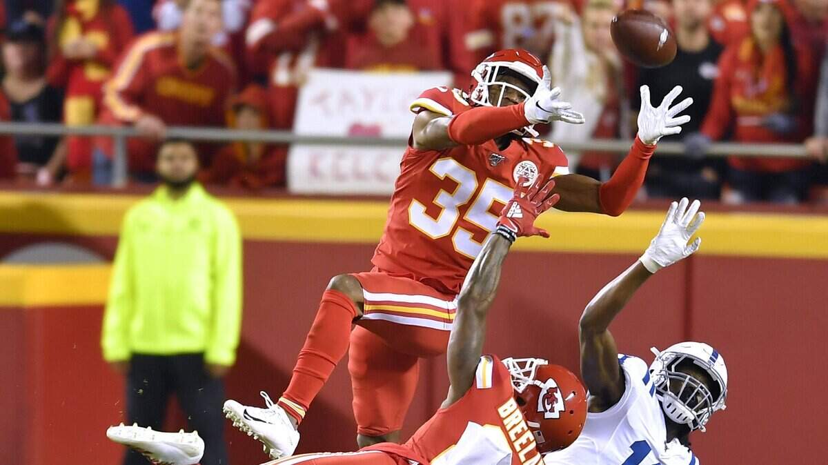 Chiefs cornerbacks Charvarius Ward and Bashaud Breeland defend a pass intended for Indianapolis Colts wide receiver Deon Cain during a game at Arrowhead Stadium.