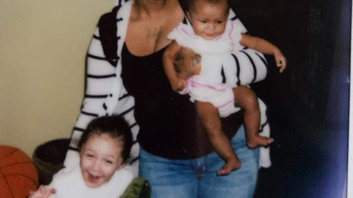 Shayla Curts poses with her two young children before her death. Mars, now 4, and Winter, 10 months, are living with their grandmother, Dezirae Curts.