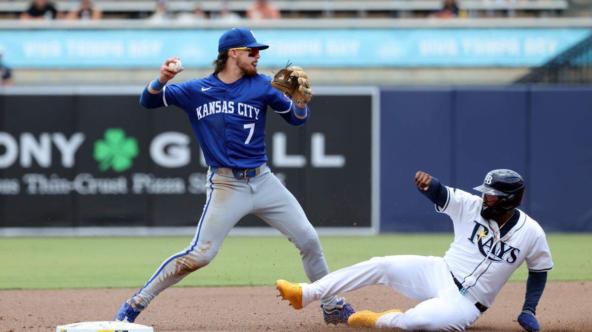 Kansas City Royals shortstop Bobby Witt Jr. (7) forces out Tampa Bay Rays third base Junior Caminero (13) and throws the ball to first base during the second inning at George M. Steinbrenner Field on May 1, 2025 in Tampa, Florida, USA.