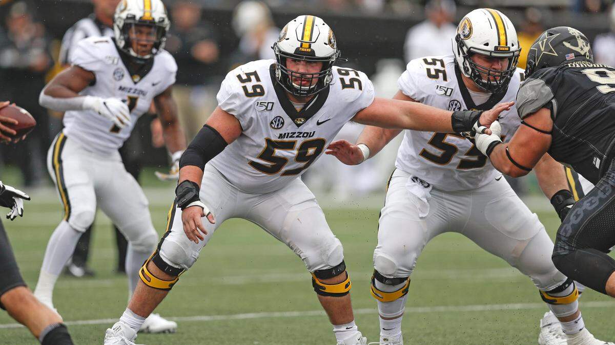 Missouri offensive lineman Case Cook (59) plays against Vanderbilt in the first half of an NCAA college football game Saturday, Oct. 19, 2019, in Nashville, Tenn. (AP Photo/Mark Humphrey)