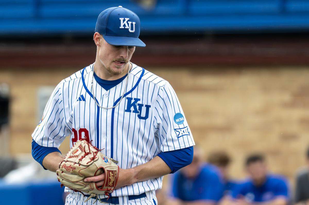Kansas Jayhawks pitcher Boede Rahe (29) prepares to throw in the ninth inning against the Northeastern Huskies during an NCAA baseball tournament game at Hoglund Ballpark on Friday, May 29, 2026, in Lawrence