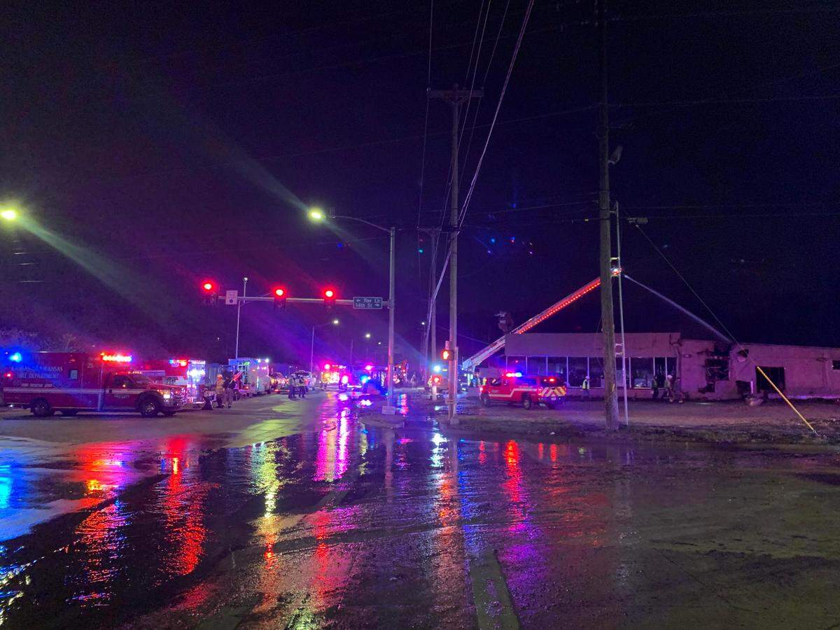 Kansas City, Kansas firefighters worked a two-alarm blaze Friday night at a liquor store in the 1300 block of Merriam Lane.
