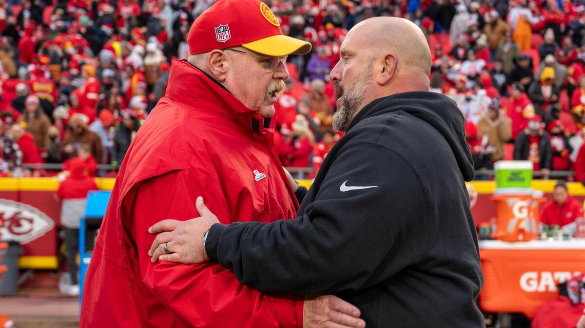 Kansas City Chiefs head coach Andy Reid and Las Vegas Raiders interim head coach Antonio Pierce meet at midfield after the Raiders defeated the Chiefs 20-17 in an NFL football game on Monday, Dec. 25, 2023, in Kansas City.